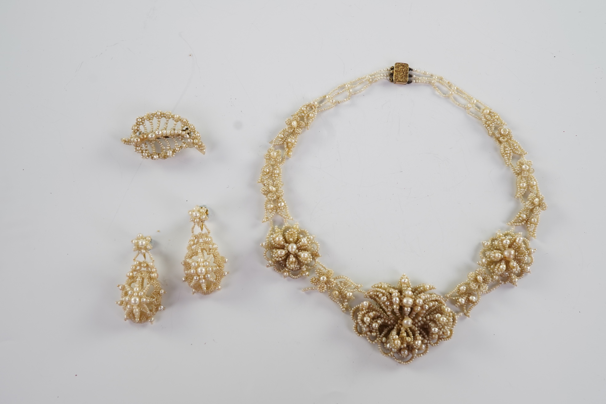 A Regency seed pearl necklace, brooch and pair of earrings, early 19th century